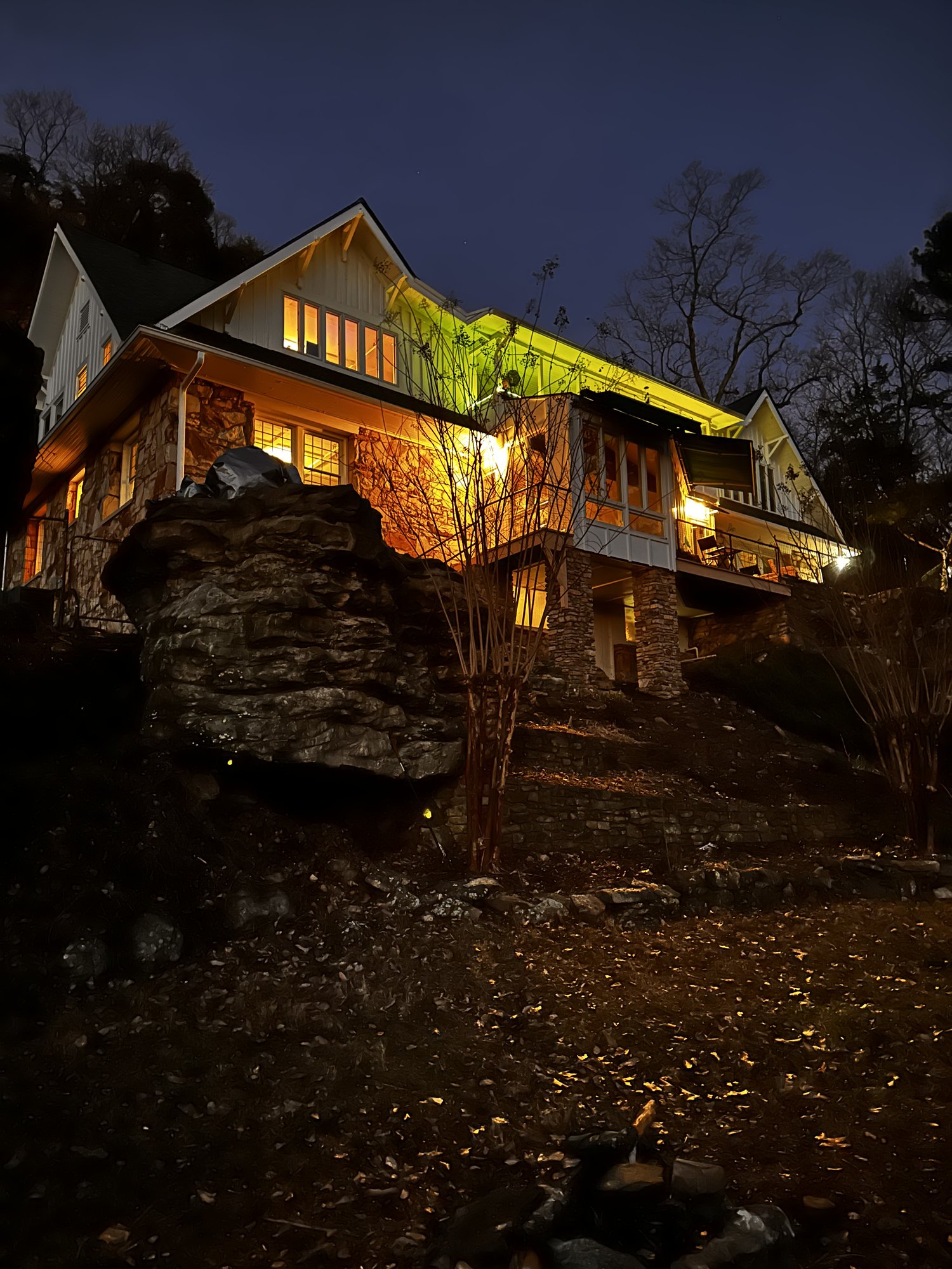 Mini On The Mountain lit up on the hillside at night