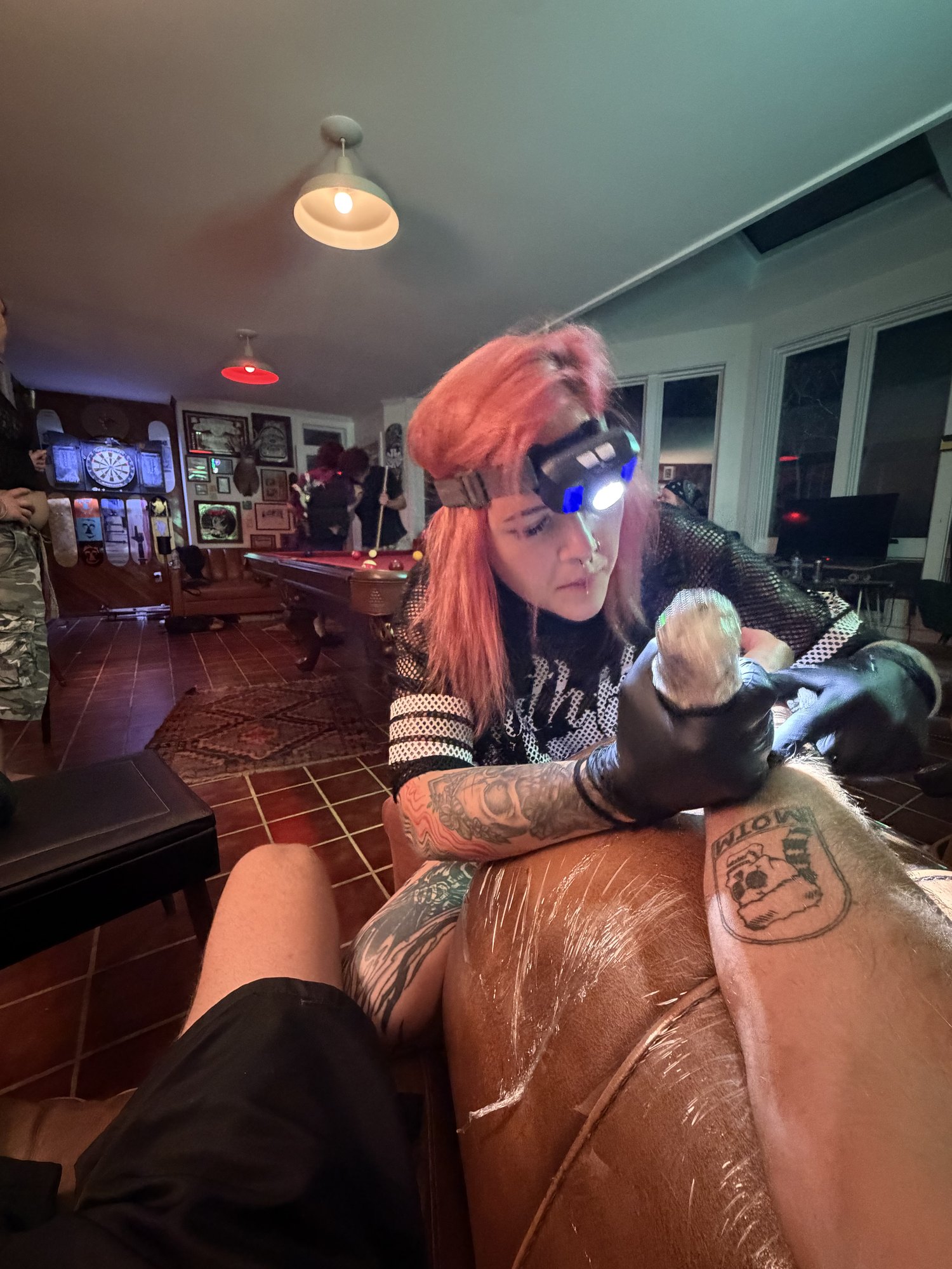 Flash tattoo at the house, pool table in the game room