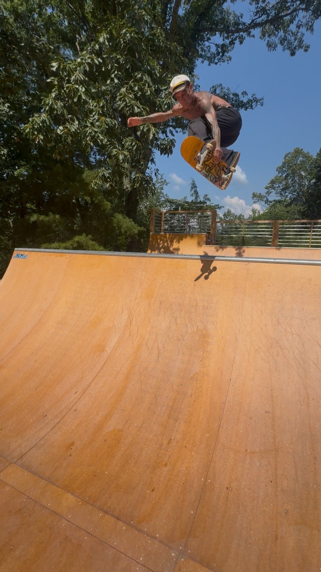 Kris Markovich in the air over the backyard mini