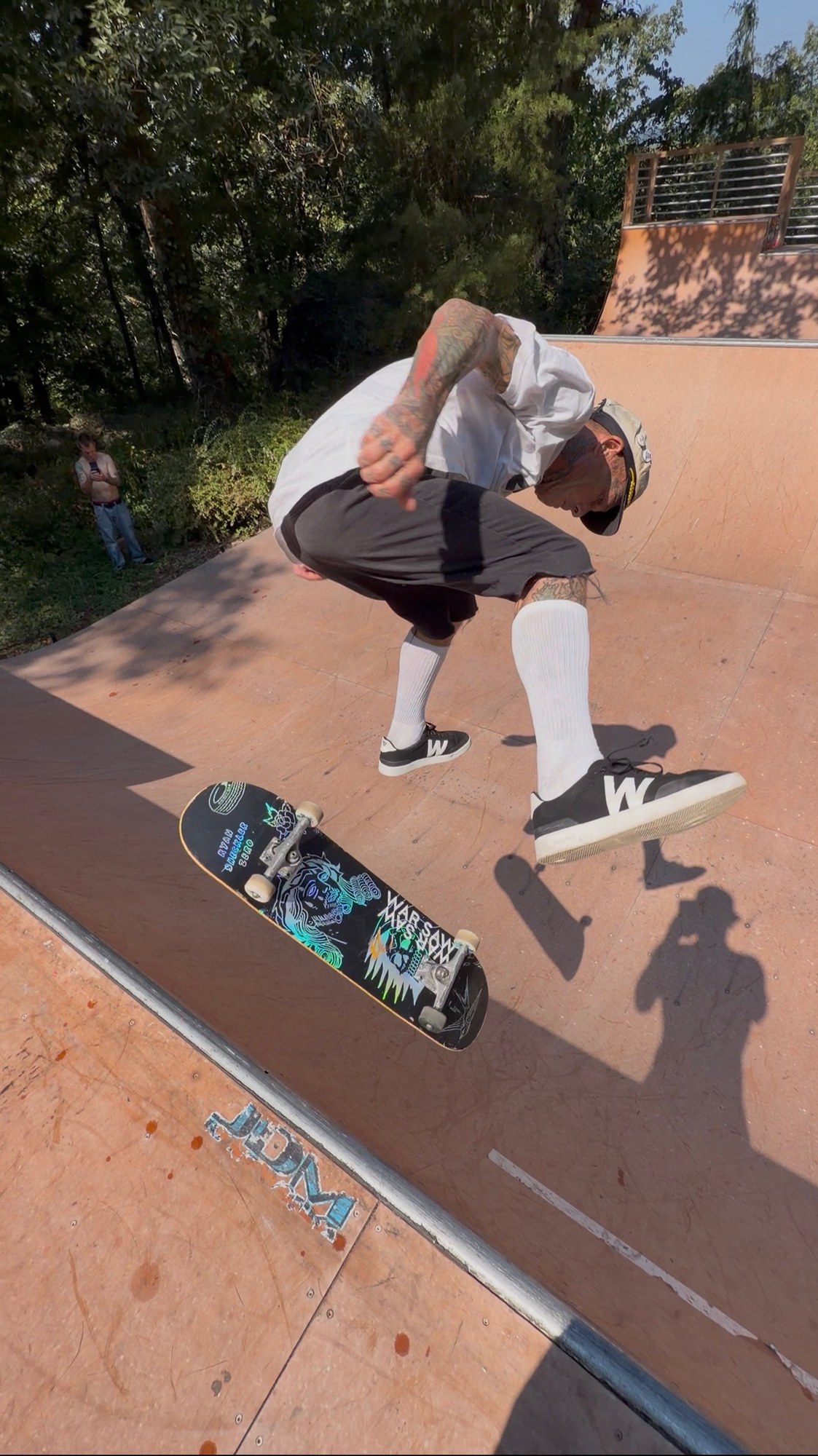 Kris Markovich kickflipping on the Mini On The Mountain ramp