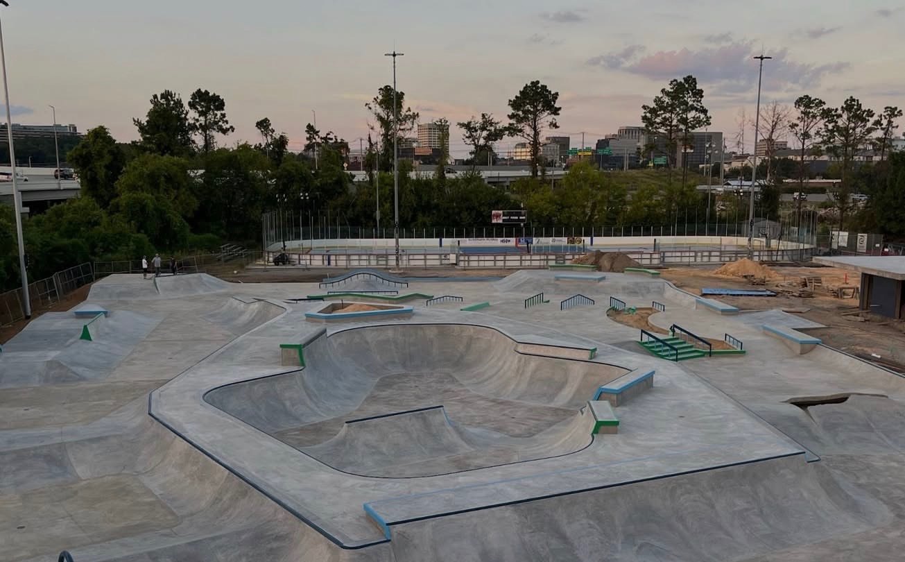 Wide view of the new Chattanooga concrete skatepark at dusk